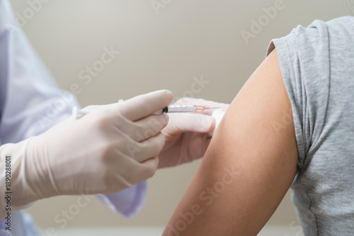 Fotografie People getting a vaccination to prevent pandemic concept