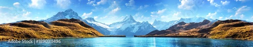Mountain lake set against a backdrop of snow-capped mountains, creating a serene alpine landscape | widescreen | looped animation