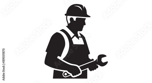 A construction worker holding wrenches standing confidently in a professional stance