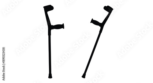 Pair of crutches depicted in a stark black silhouette