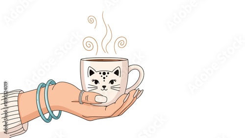 Woman holding a warm steaming cup of coffee or hot chocolate decorated with a cute cat face on a clean white background for a cozy morning.