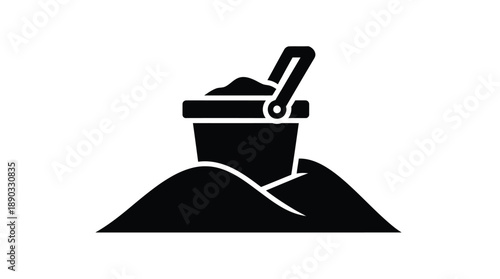 Black silhouette of a bucket and sand pile beach equipment silhouette