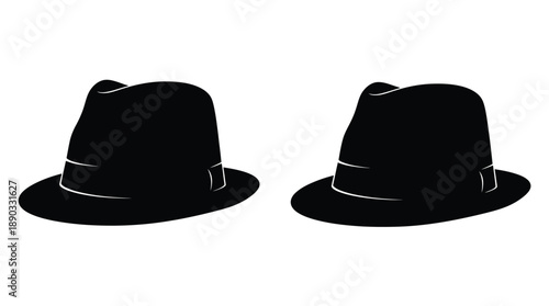 Two black fedora hats are displayed as a striking silhouette