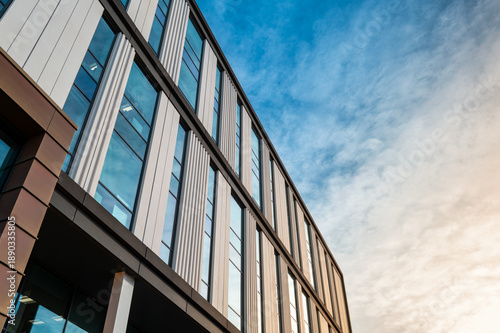 Abstract view of a medical research building located at the famous medical campus in Cambridge, UK. Seen against a winter setting sun.