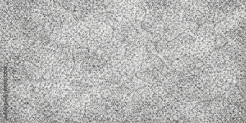 A rough grey fabric texture with a grunge macro pattern resembles a dark cement surface or old concrete wall material for a textured stone wallpaper design