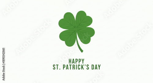 Green four leaf clover with happy st patrick's day text on white