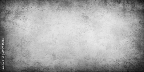 Dark aged concrete and grunge metal background featuring a textured grey stone surface with a vintage dirty pattern and rough black cement wall design