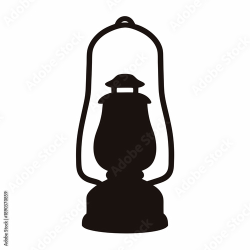 Silhouette of an antique kerosene lantern, a symbol of vintage illumination