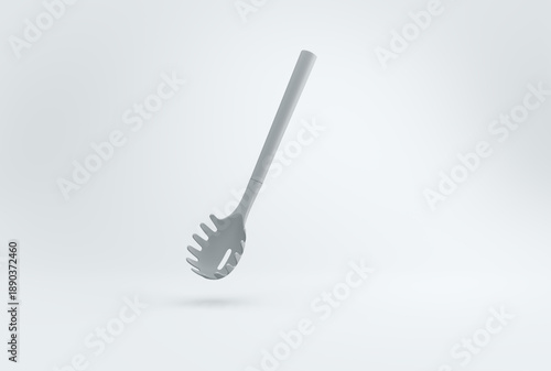 Photography Gray silicone pasta server spoon isolated on a light gray background