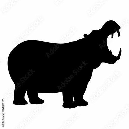 Angry hippo silhouette with its mouth open ready to attack someone