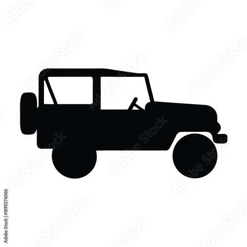 Silhouette of a classic four wheel drive jeep with a spare tire