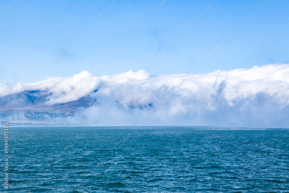 Naklejka premium storm clouds above the sea
