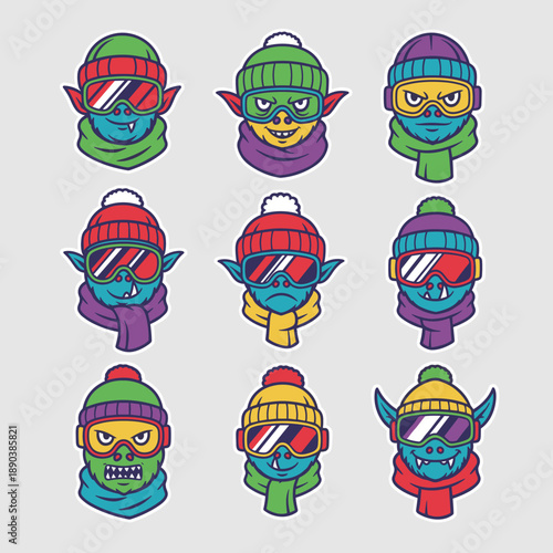 Winter goblin monster character head avatar set wearing colorful ski goggles beanies and scarves for sports and holiday mascot graphic design