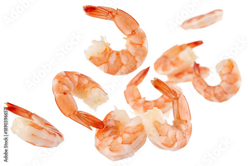 peeled shrimps falling mid-air isolated on a transparent background.