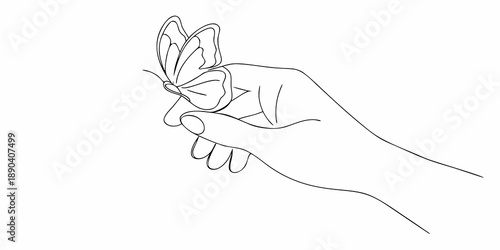 A delicate butterfly rests gently on an open human hand