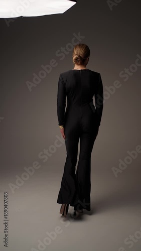 Wallpaper Mural Elegant woman in black jumpsuit. Seductive woman concept. Torontodigital.ca