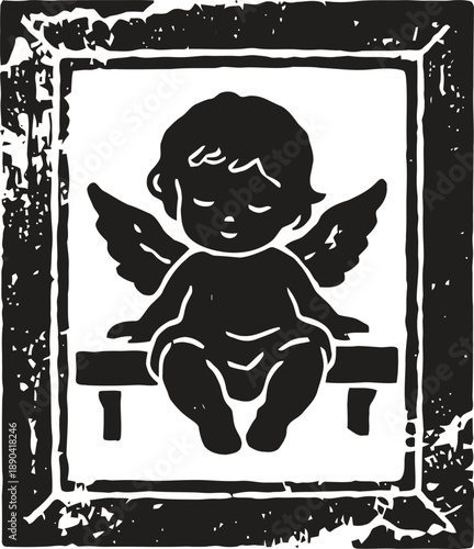 Angel child silhouette sitting with wings inside a distressed decorative frame