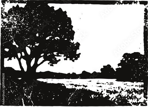 silhouette of trees and grassland near lake with clear sky and natural landscape