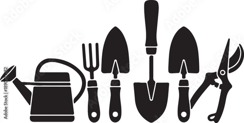 Garden tools including watering can fork trowel spade and pruning shears arranged neatly