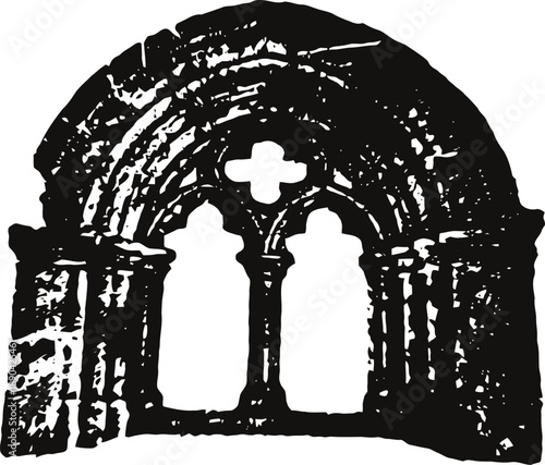 Historic stone arch window with columns and decorative cross shaped opening, medieval architectural element