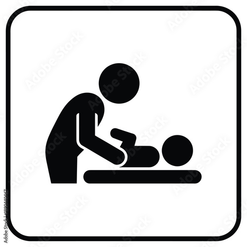 A simple black pictogram depicts a parent changing a baby s diaper