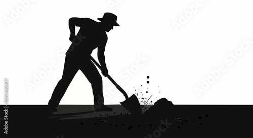 Silhouette of a man digging with a shovel.