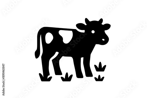 Spotted dairy cow standing in a grassy field minimalist silhouette