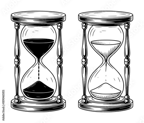 Vintage hourglasses with black sand falling the other with white sand time measurement