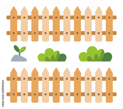 Wooden picket fences with green bushes and a seedling white background garden