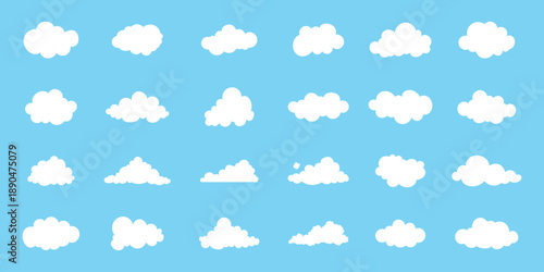 A charming collection of various white cartoon clouds floating serenely in a blue sky