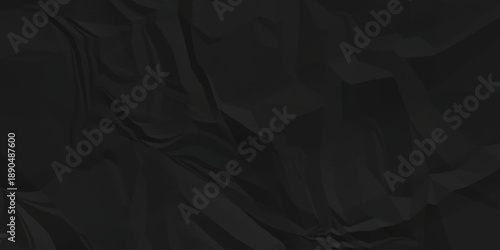 Crumpled paper Blank black crumpled and creased paper poster. Isolated light grungy wrinkled torn old paper material abstract texture background.