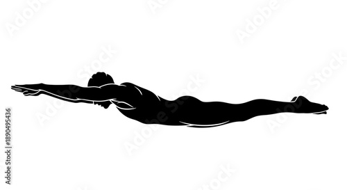 Silhouette of a person swimming in a streamlined position.