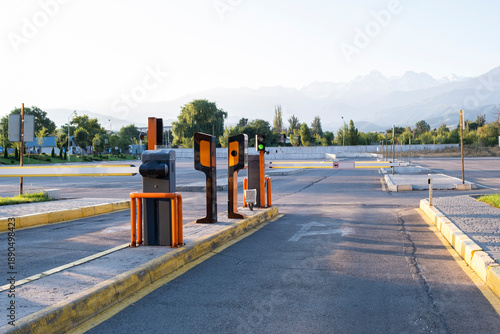 Barrier for paid parking of cars for visitors of the business center