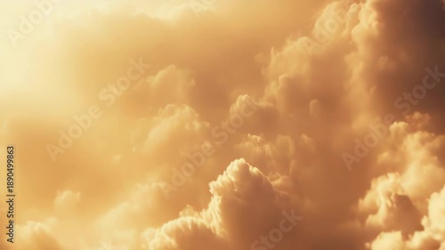 Clouds are forming a serene sky during the golden hour, with warm sunlight casting a soft glow and creating dramatic textures, ideal for backgrounds or conceptual themes of hope