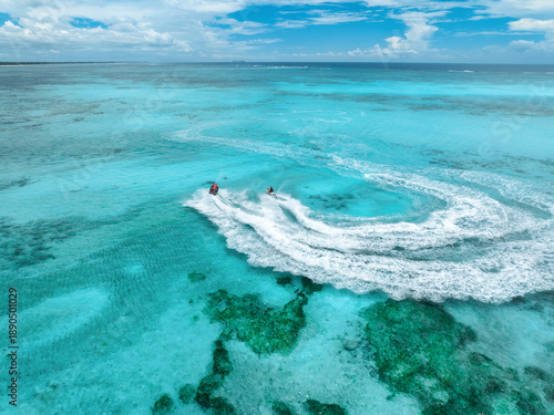 Aerial view of jet skis ove...