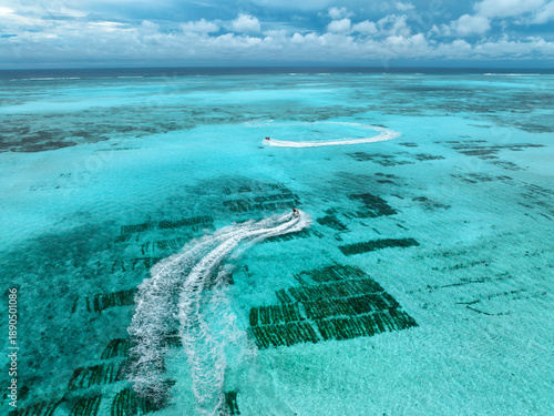 Aerial view of jet skis ove...