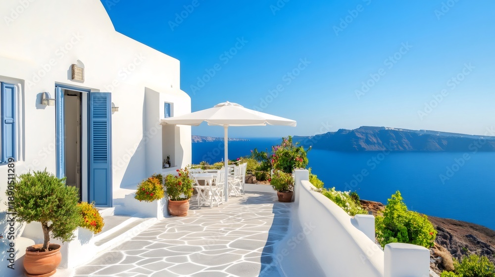 Obraz premium Santorini island balcony overlooking the deep blue aegean sea