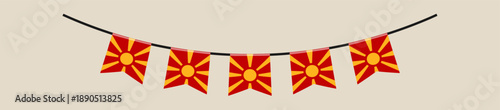North Macedonian flag bunting banner hanging on a string for a patriotic celebration or national event decoration.