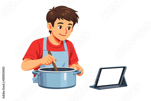 Boy stirs food in a pot while following a recipe on a tablet during the day at home in a kitchen