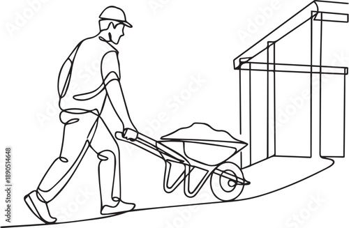 Man pushing a wheelbarrow with sand near a construction site