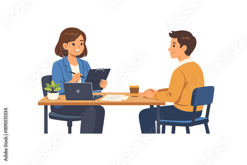 Two people have a meeting at a table in an office discussing a project while taking notes and drinking coffee