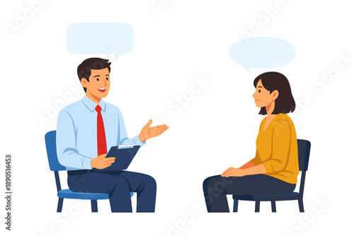 Two people have a conversation in a small room during a meeting to discuss an important topic while sitting on blue chairs