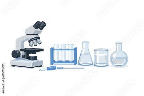 Laboratory equipment arranged on a clean table with a microscope, test tubes, beakers, and a dropper ready for use in a science experiment
