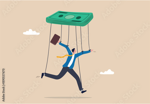 Being controlled by money, capitalism, greedy working environment, slavery, decision manipulation or bribery and corruption concept, pathetic slave businessman puppet doll being controlled by money.