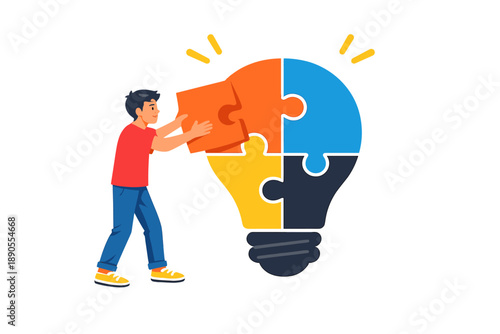 A boy places a puzzle piece into a light bulb shape to represent creativity and problem solving in a fun and engaging manner during a learning activity