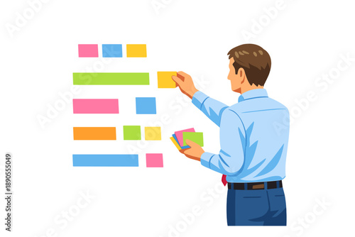 Person uses sticky notes on a wall to organize tasks and ideas during a meeting in an office setting in the daytime