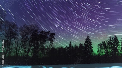 Startails and northern lights - 4k timelapse landscape.