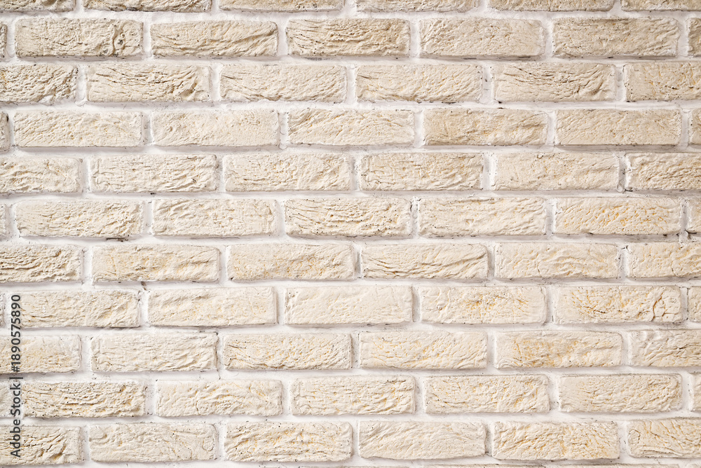 Obraz premium Light brick wall texture with horizontal masonry pattern and natural rough surface. Neutral beige background for design projects, websites, posters and presentations.