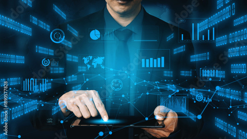 Konstfotografi A business professional interacts with a tablet, surrounded by virtual data visualizations and charts, highlighting the significance of digital data analysis in modern business