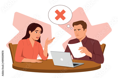 A frustrated businesswoman discussing with a colleague at a meeting table with a laptop and papers